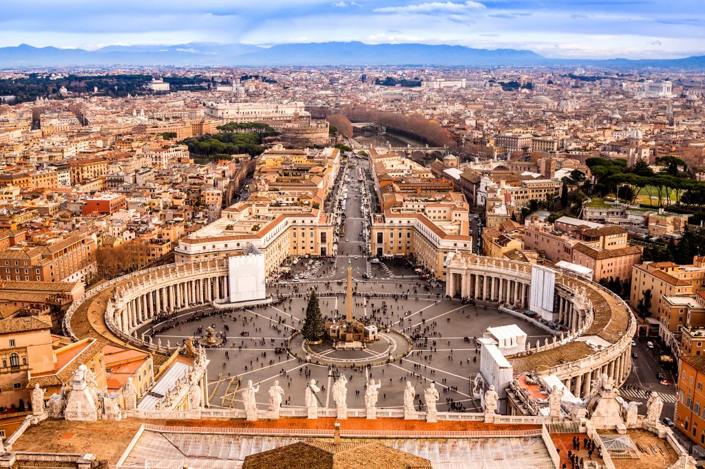 Saint Peter's Square in Vatican and aerial view of the city in Rome, Italy
