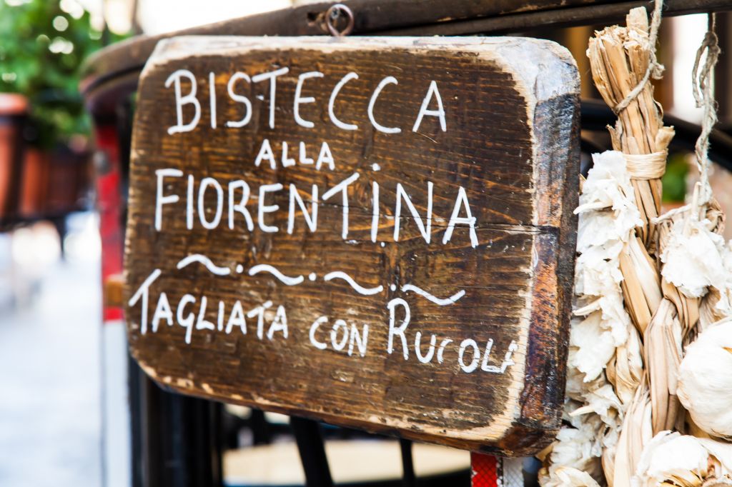 Sign made of wood with Bistecca alla Fiorentina (Florence steak) words, Italy