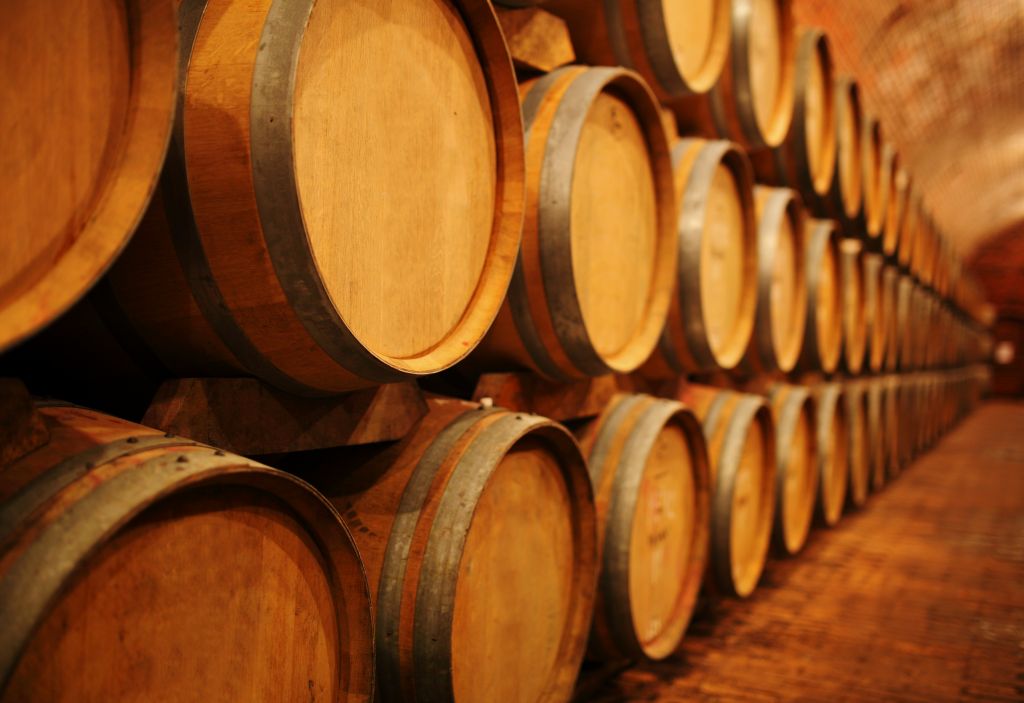 Wine barrels in cellar, Italy